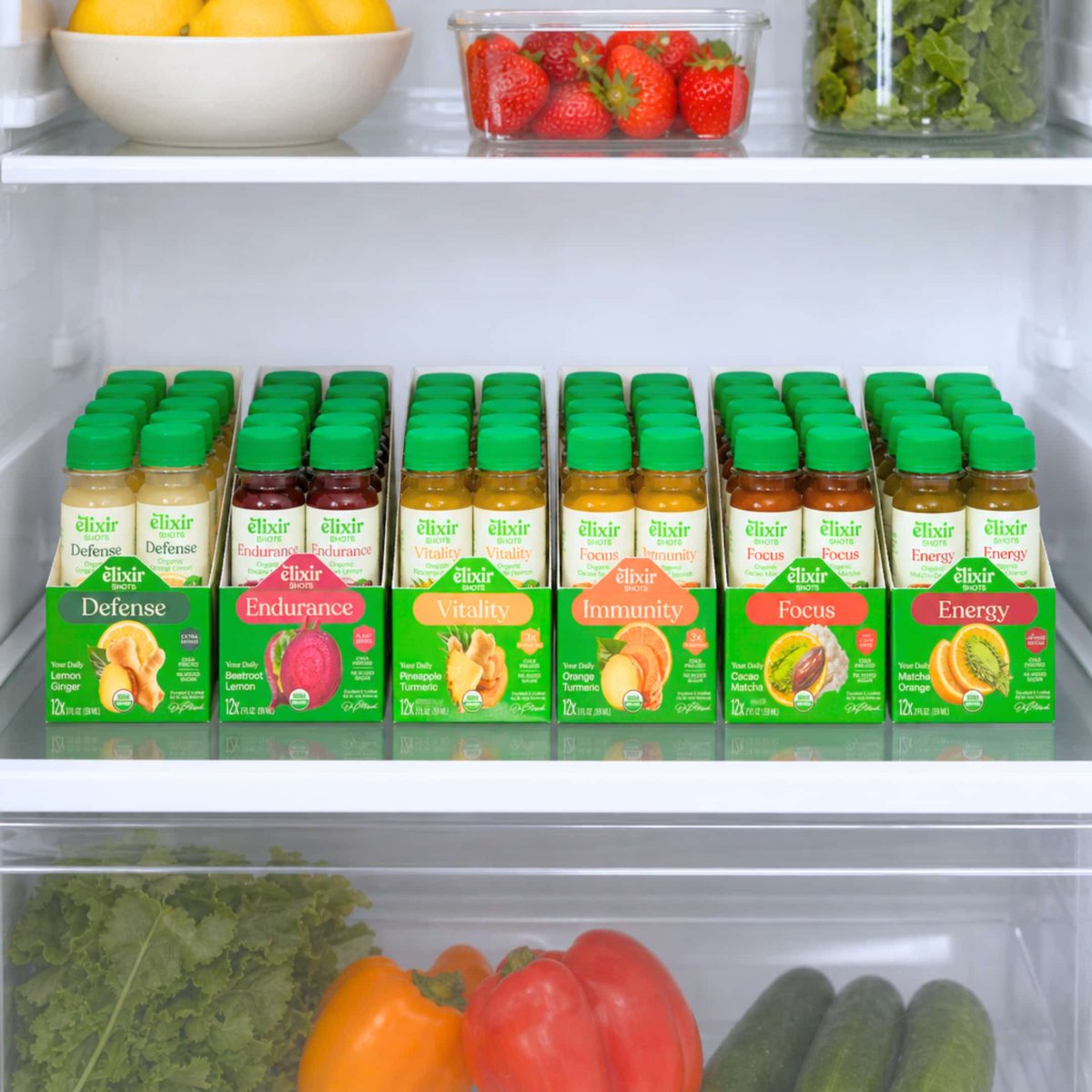 A 12-pack of Elixir shots on a refrigerator shelf